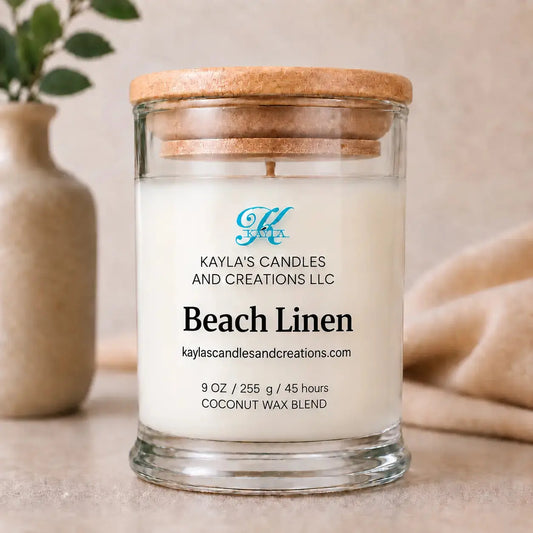 Beach Linen scented coconut wax blend candle by Kayla's Candles & Creations in a clear jar with natural wood lid